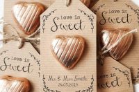 heart-shaped candies with personalized cardboard tags are lovely wedding favors to try