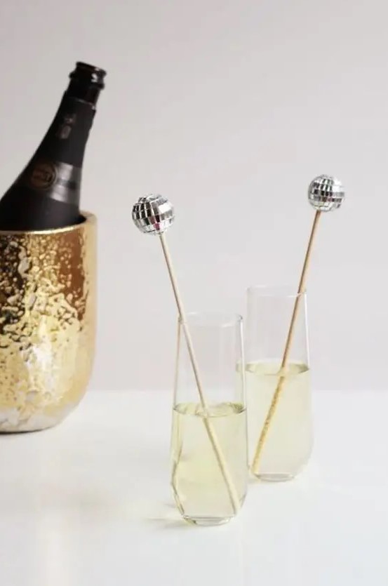 make a set of disco ball drink stirrers for your New Year's Eve wedding or for just glam and fun one