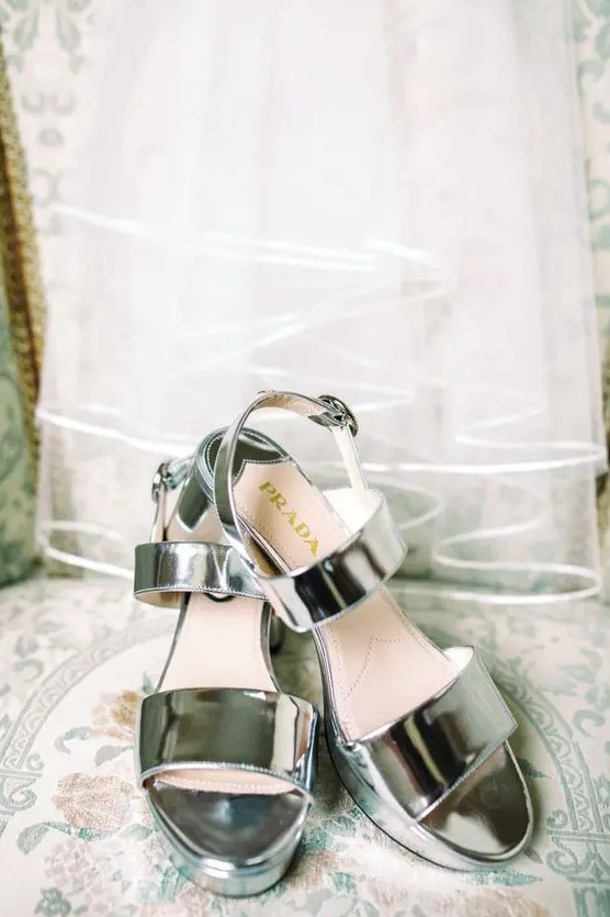 shiny silver strappy platform wedding shoes like these ones are a super trendy and fashionable idea for a modern bride