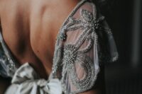silver embroidery with rhinestones is a pretty addition to a grey wedding dress is a lovely idea for any wedding