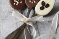 spoons with milk, dark and white chocolate and nuts, coconuts and coffee are creative and cool wedding desserts