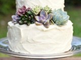 a white textural buttercream wedding cake with succulents is a chic idea with a trendy feel – who wants blooms when you may have succulents
