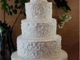 a textural white buttercream wedding cake with sugar beads is a cool and bold idea for a more relaxed wedding