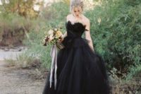 a chic A-line wedding dress with a strapless lace bodice and a layered tulle skirt