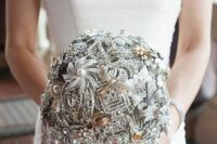 a fabulous brooch wedding bouquet in silver is a fantastic solution for a vintage-inspired bride