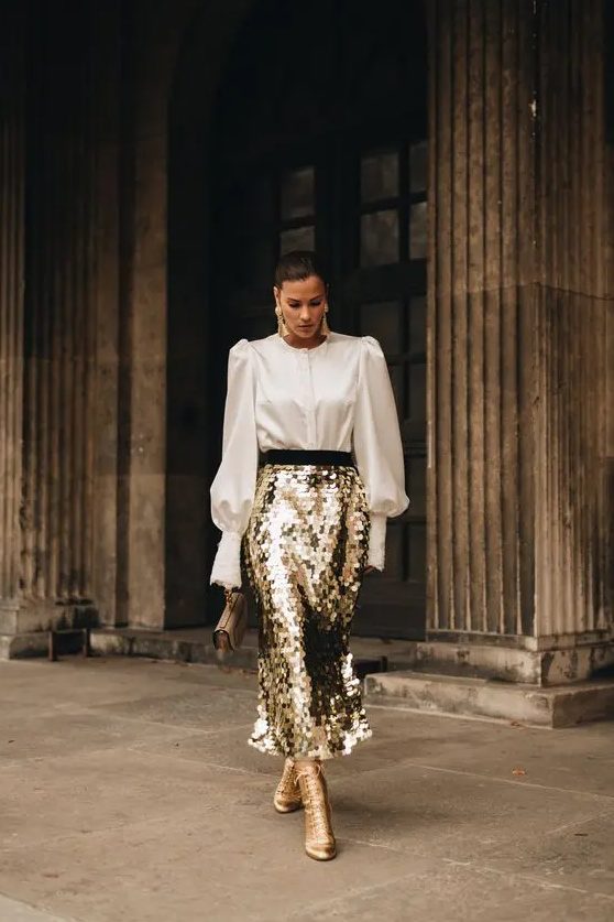 A gold A line square sequin midi skirt is a bold and chic idea to wear with anything you want