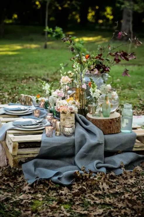 a low table made of pallets can be used for styling a wedding picnic   make it of pallets yourself stacking pallets on each other