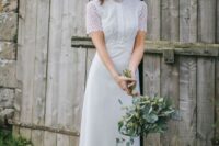 a chic yet modest wedding dress with a boho lace bodice, a turtleneck, short sleeves and a plain skirt