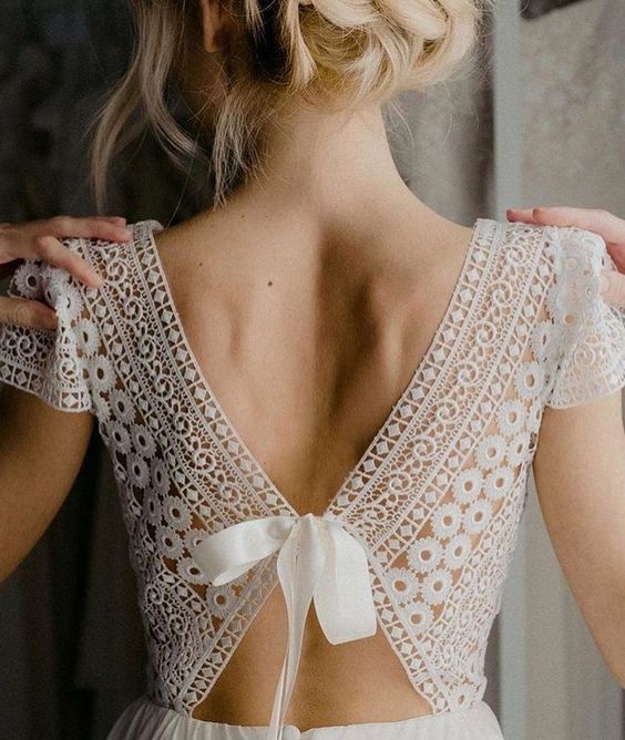 a crochet lace cutout back with a ribbon bow looks boho and girlish and will add a playful accent to the look
