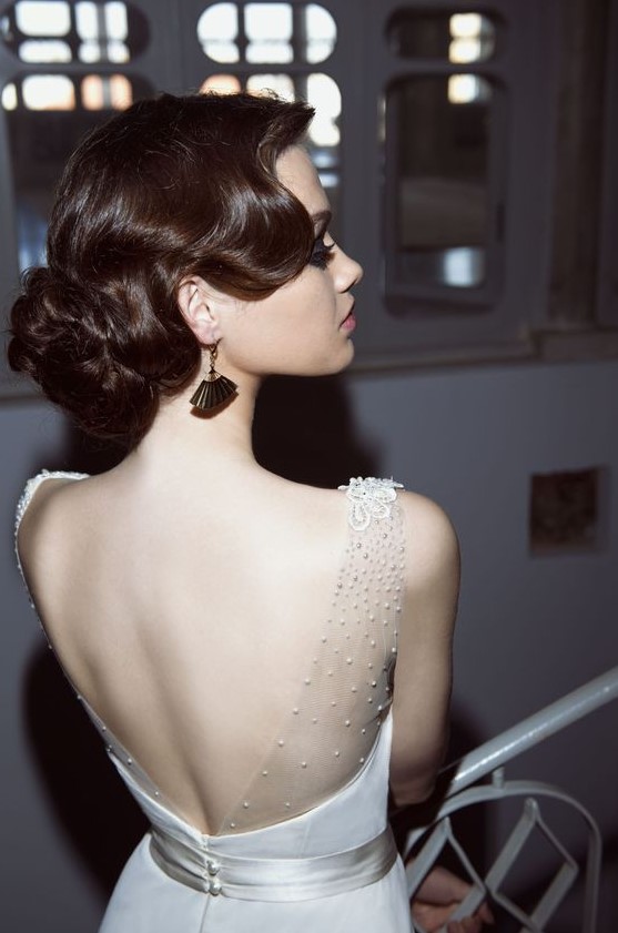 a fantastic vintage wave updo with a low twisted bun looks ultimately refined and very chic