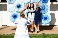 a light and bold blue paper fan wedding backdrop is a stylish idea to rock for any wedding, it’s cool and easy to make