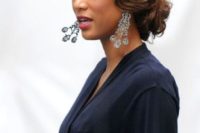 a retro low updo with waves is 20inspired and very chic and bold, add vintage makeup and go