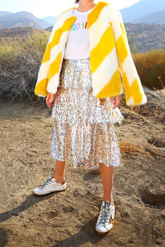 a silver sequin A line midi skirt with tiers is a bold modern idea with a feminine feel