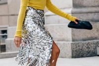 a silver sequin midi wrap skirt with fringe is a catchy and interesting take on a usual piece