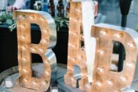 accent your wedding bar with large marquee letters – they are a nice wedding decor idea and you can DIY them