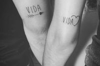 cool Vida tattoos on the back of the forearms, an arrow and a heart are what you need for a bold look