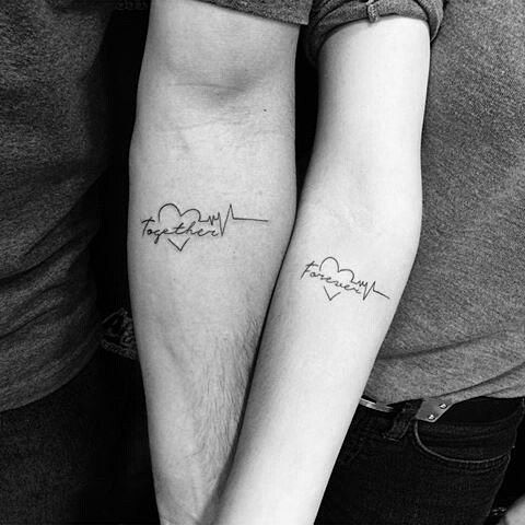 cool matching Together tattoos with hearts and a heart beat on the forearms are very modern and bold