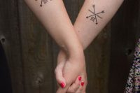 creative arrow and name tattoos on the forearms customized for the couple are cool and bold