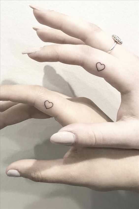 cute heart-shaped finger tattoos are elegant and simple ideas for your wedding and just to celebrate your relationship