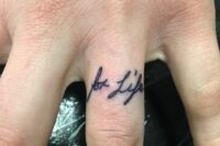 ‘for life’ wedding tattoo placed on the ring finger is a great idea to celebrate your relationship