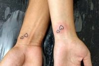 little double heart tattoos on the wrists are amazing for a modern couple, you can make them anywhere