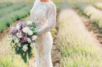 long sleeve sheath lace applique wedding dress with a high neckline and a sash to highlight the waist