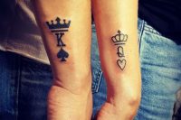 matching King and Queen tattoos with crowns are nice for card-loving couple and not only