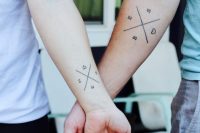 monograms, lines and hearts on the forearms are simple and stylish tattoos to rock together