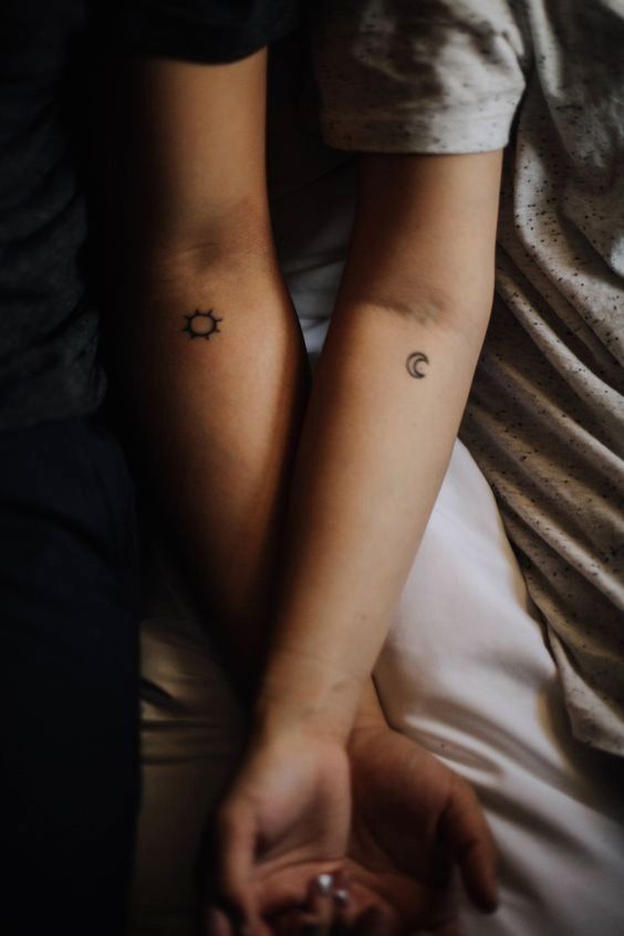 the sun and the moon matching tatotos on the forearms look nice and chic and are stylish