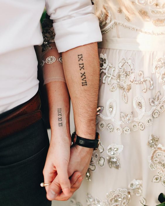 the wedding date done in Roman numbers along the forearm are a stylish and very popular idea to rock