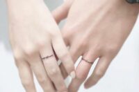 word tattoos instead of traditional wedding bands are a fresh and cool solution for a wedding