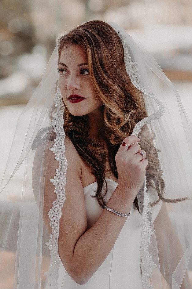 a beautiful one layer wedding veil with a lace edge and embellishments is a lovely idea for a classic and chic bridal look