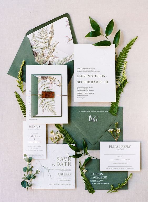 a botanical wedding invitation suite in green and white plus botanical prints is amazing for a spring or summer wedding