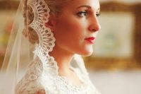 a classic curled updo with a mantilla veil with a lace edge are a great combo for a chic and refined classic bridal look