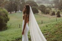 a classic long cathedral veil of one layer is a gorgeous idea to finish off your bridal look