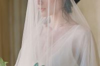 a classic long one layer veil paired with a gorgeous gold rhinestone headpiece are a fantastic combo for a wedding