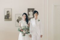 a creamy bridal pantsuit with a white top, nude shoes and a succulent boutonniere