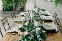 a lovely table setting with an eucalyptus table runner