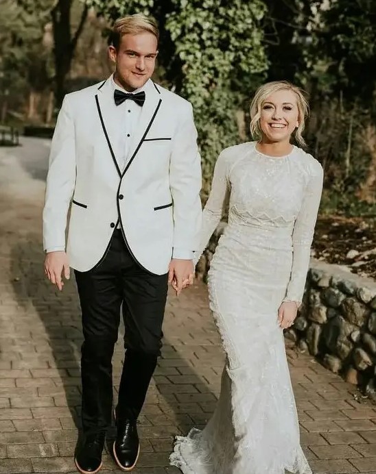 a high neckline sheath wedding dress with long sleeves, textural lace and beading