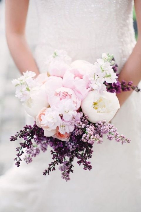 a lilac and peonies wedding bouquet in blush and purple tones is pure luxury in candy colors