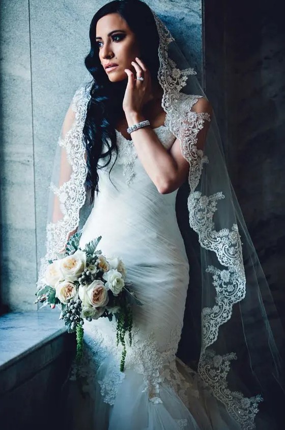 a mantilla lace edge veil with embellishments is a fantastic detail to add to the classic bridal look, it's glam and chic
