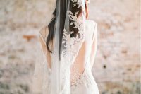 a mantilla veil with lace appliques is a fantastic and sophisticated accessory to finish off a bridal look