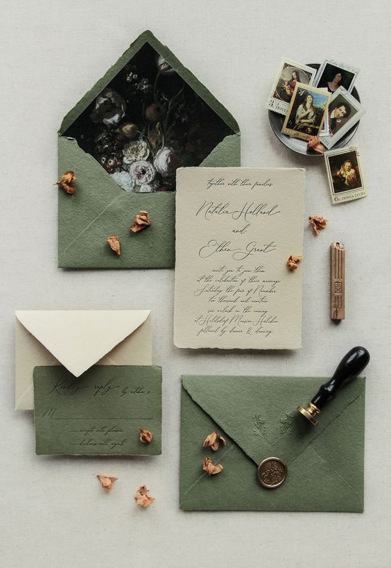 a refined wedding invitation suite in olive green and neutrals, with floral lining, a raw edge and calligraphy is a chic idea