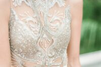 a wedding dress with a fantastic illusion embroidered and beaded gold bodice plus a plain skirt