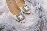 absolutely classic and timeless white Manolo Blahnik shoes with embellished buckles will never go out of style and come in a wide range of colors