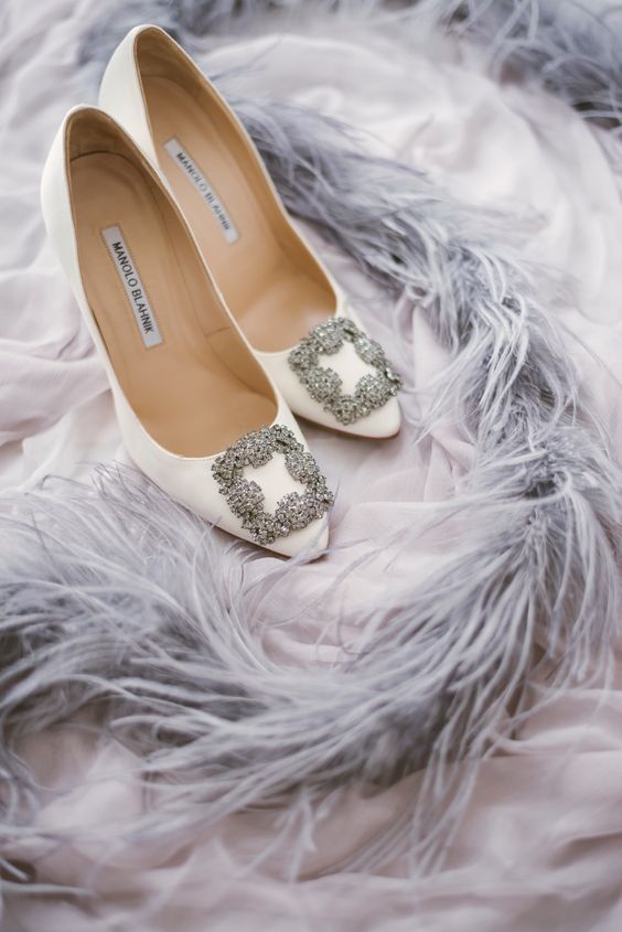 absolutely classic and timeless white Manolo Blahnik shoes with embellished buckles will never go out of style and come in a wide range of colors