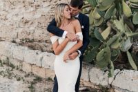 an off the shoulder mermaid wedding dress with a train is a gorgeous and sexy idea for a classic bridal look