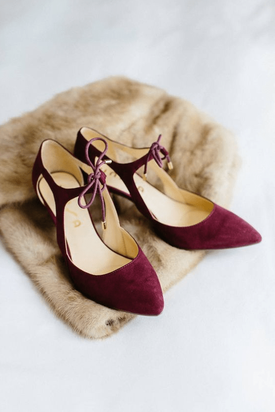burgundy shoes with cutouts and ties are a great vintage-inspired idea for a winter bride