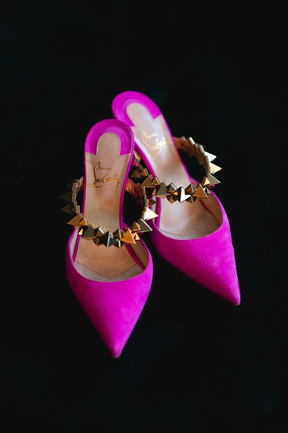 Fabulous hot pink wedding mules with spike straps are adorable and just jaw dropping
