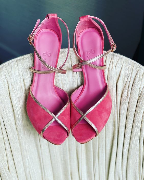 glam hot pink wedding shoes with silver edges and criss cross straps are adorable for a glam bridal look